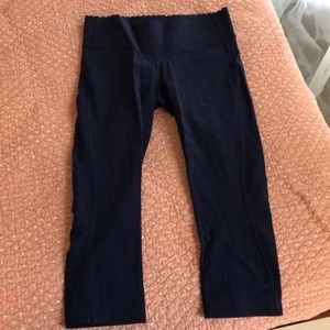 New Balance navy scalloped crop leggings.